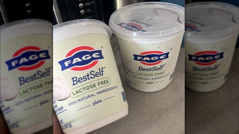 Two FAGE best self white yogurt containers on countertop
