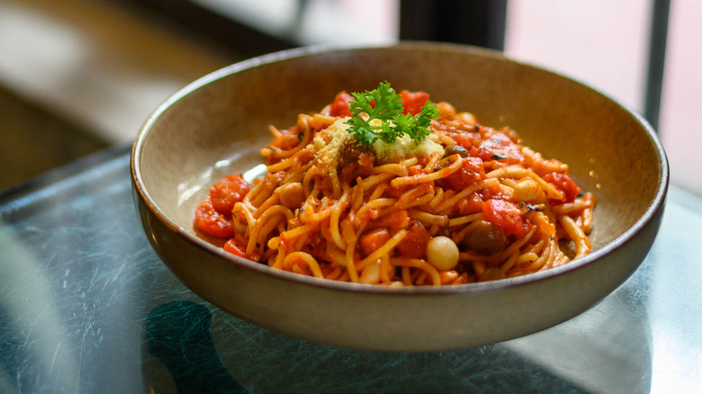 A bowl of mushroom bolognese on a table