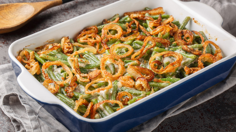 Homemade green bean casserole in a blue dish