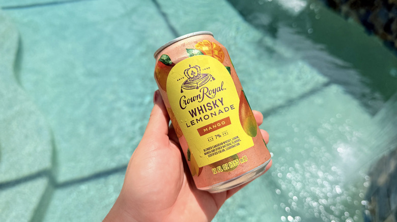 Crown Royal can in front of pool