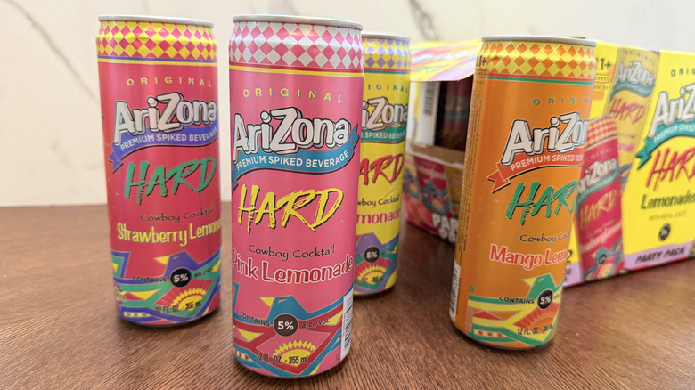 Cans of AriZona Hard Lemonades on table
