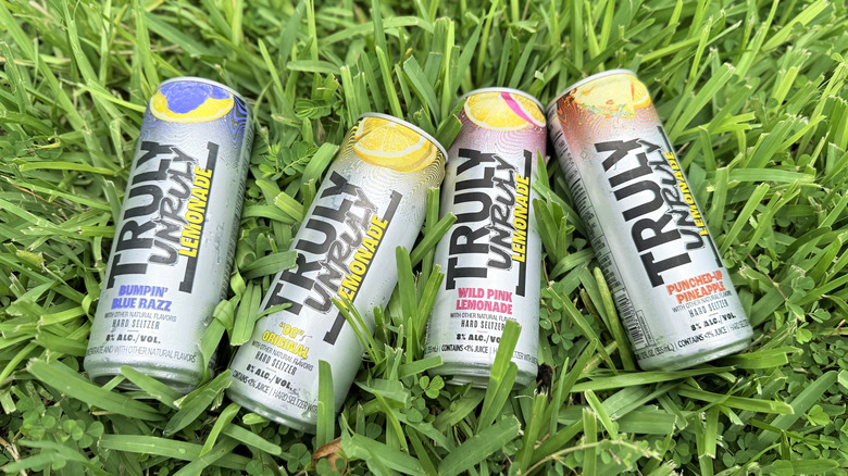 Cans of Truly in the grass