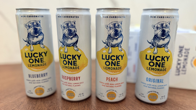 Cans of Lucky One Lemonade on the table