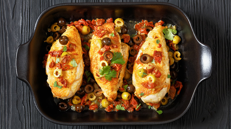 chicken and olives in baking dish