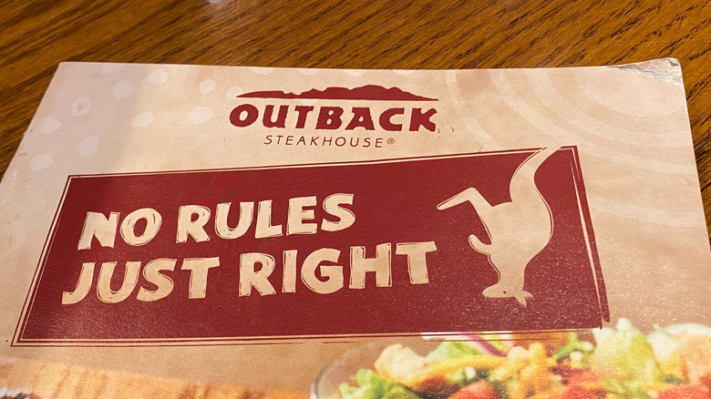 Outback Steakhouse menu on table
