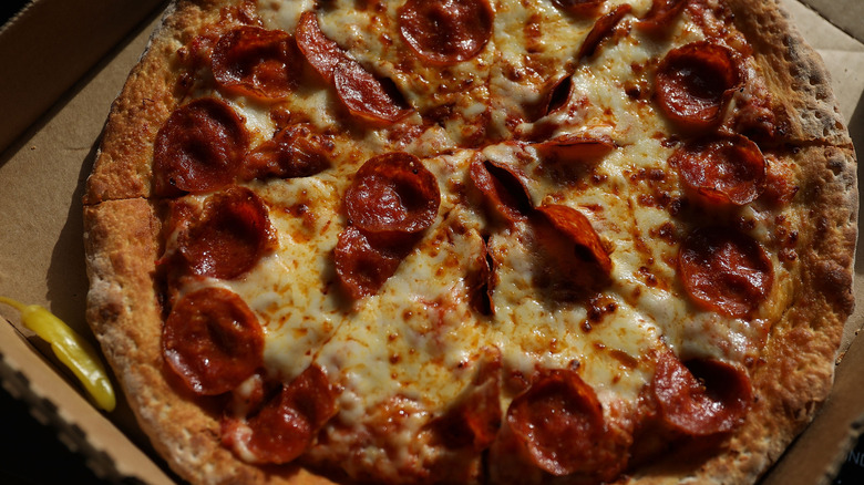 Papa John's pepperoni pizza in box
