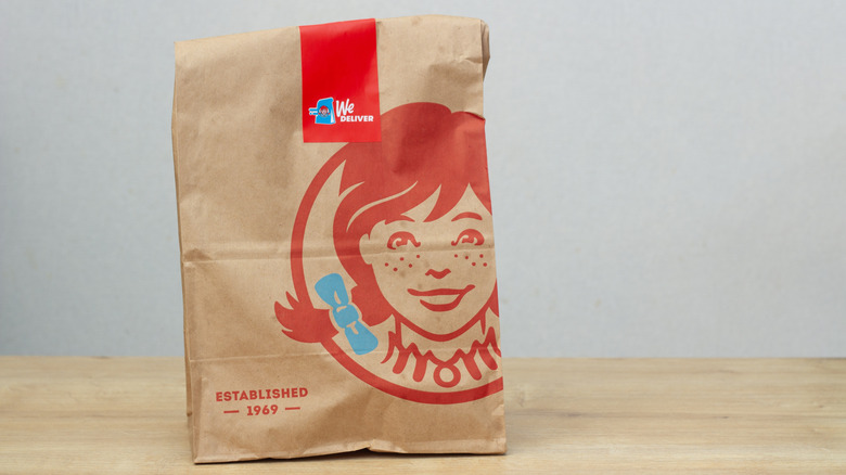 Wendy's brown bag on table