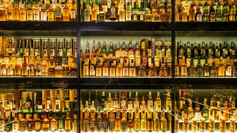 Whiskey bottles on shelves