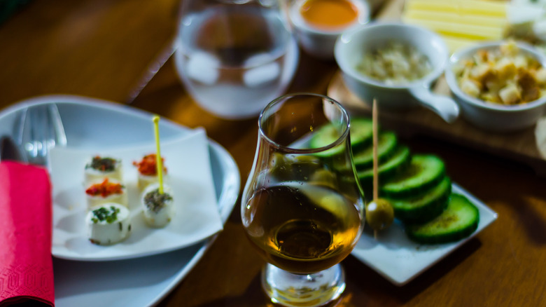 Whiskey with various food