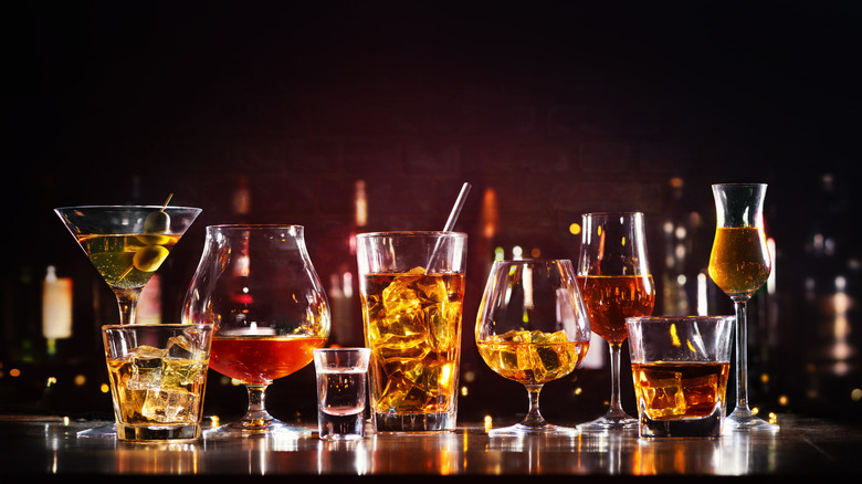 Different types of glassware filled with liquor