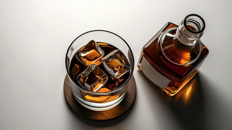 Whiskey glass filled with ice cubes