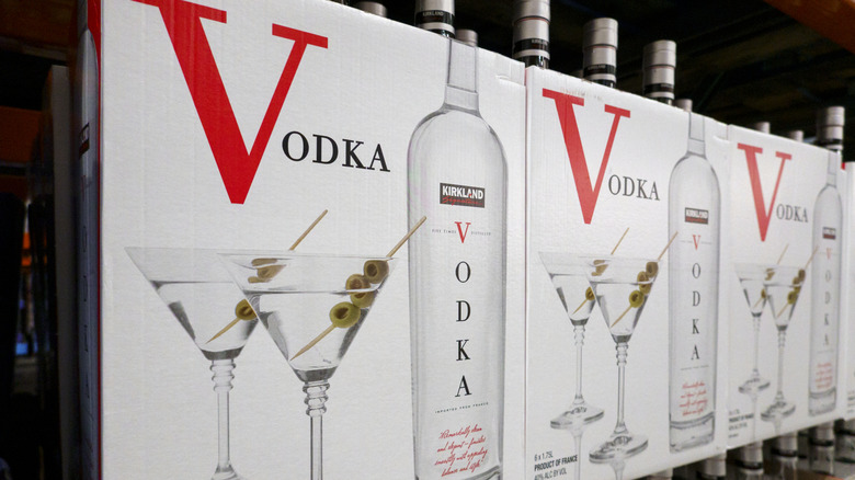 Boxes full of Kirkland Signature French Vodka on display at Costco.