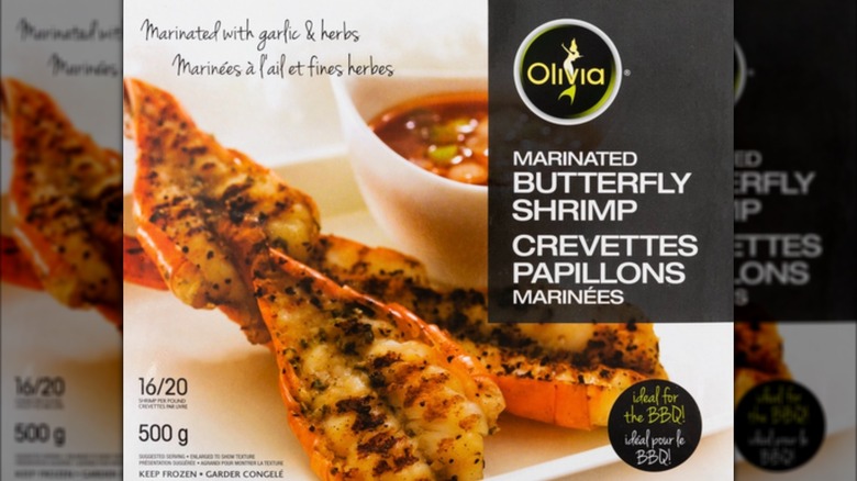 Two boxes of Olivia Marinated Butterfly Shrimp on store shelf