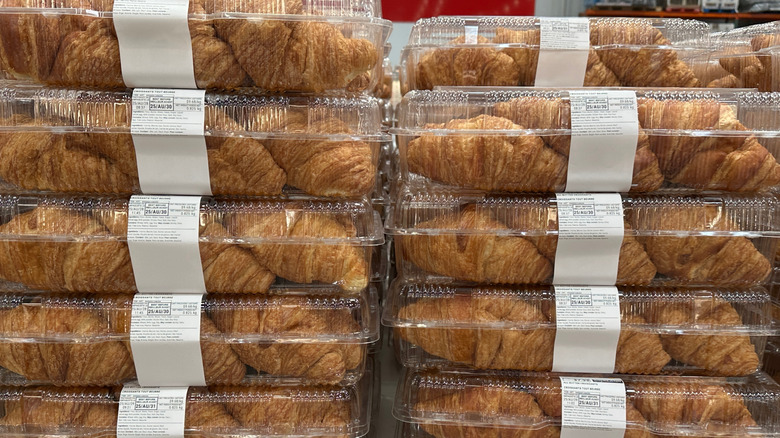Costco butter croissants stacked on display