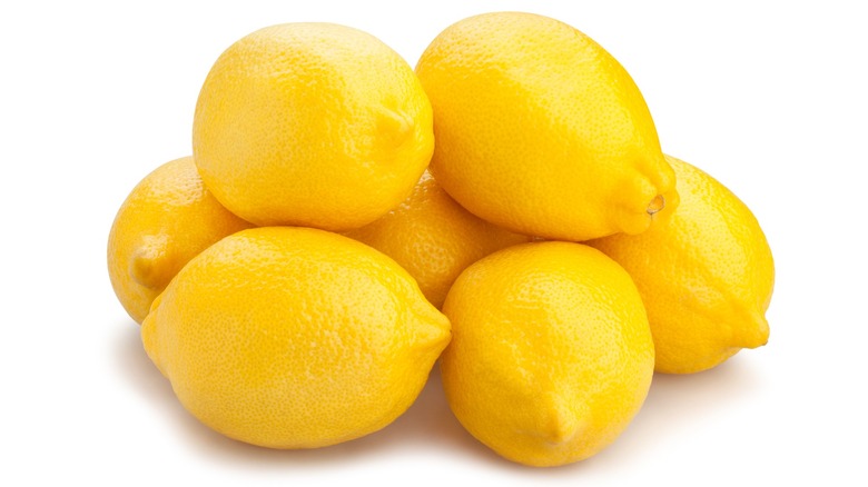 Lemon pile on white backdrop