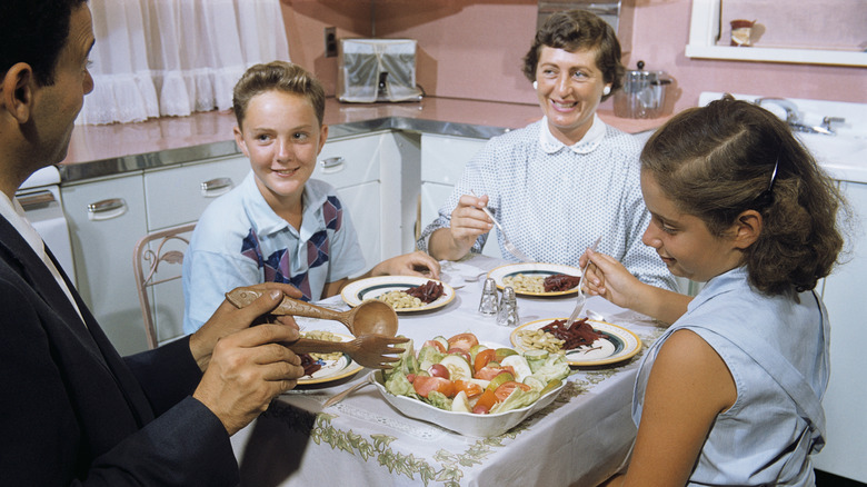 1960s family eating dinner