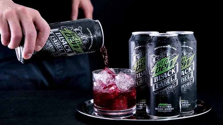 Mountain Dew Black Label being poured into glass