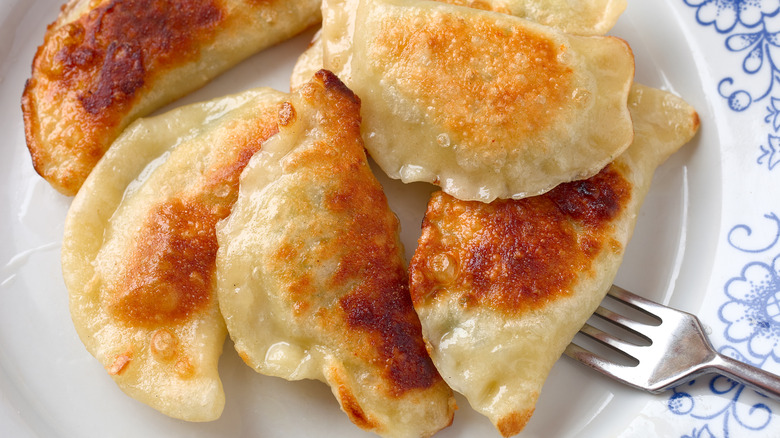 Plate of pierogi with fork