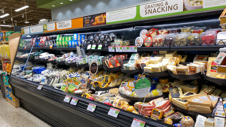 A well-stocked cheese section inside Publix.