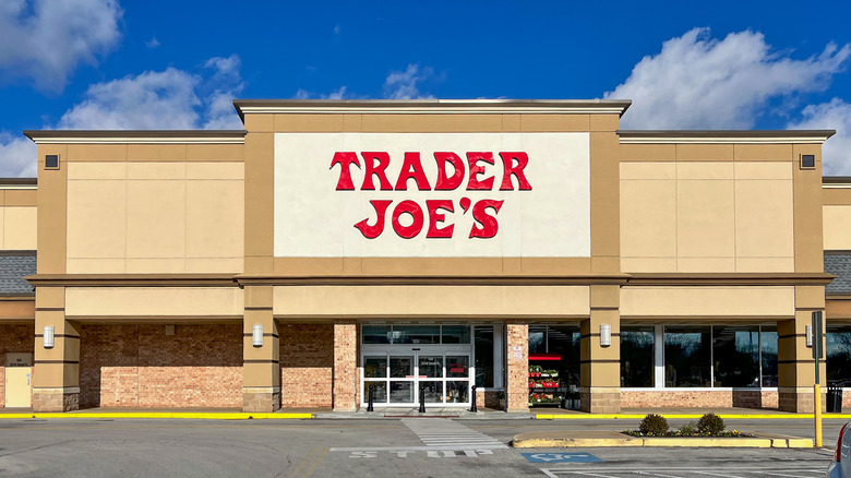 A concrete Trader Joe's with a bright red sign
