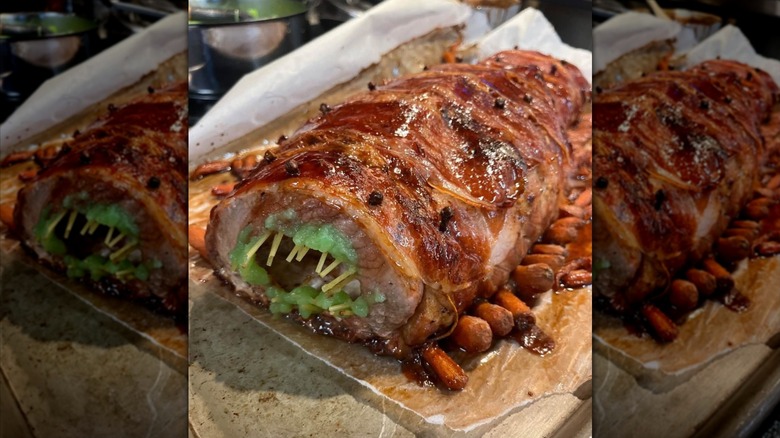 bacon-wrapped roast pork loin made to look like a monster worm