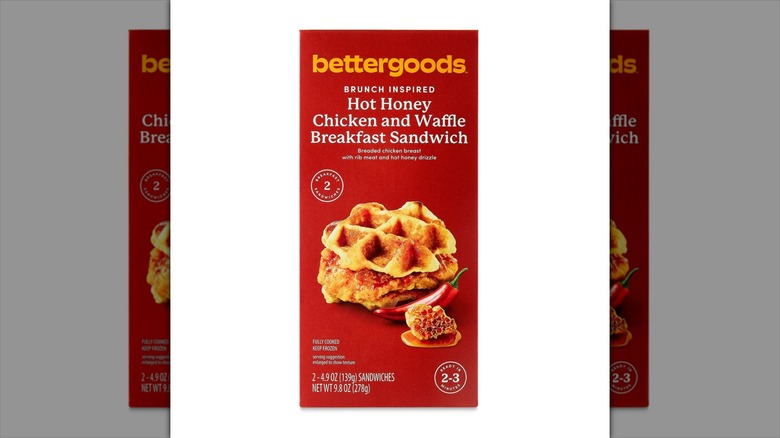Red rectangular box of Walmart bettergoods brand Hot Honey Chicken and Waffle Breakfast Sandwich