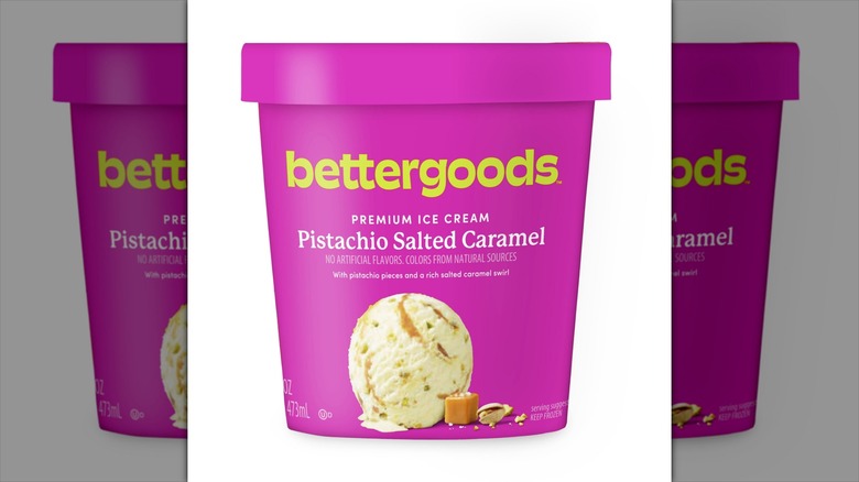 Pink ice cream carton of Walmart Bettergoods brand Pistachio Salted Caramel Ice Cream