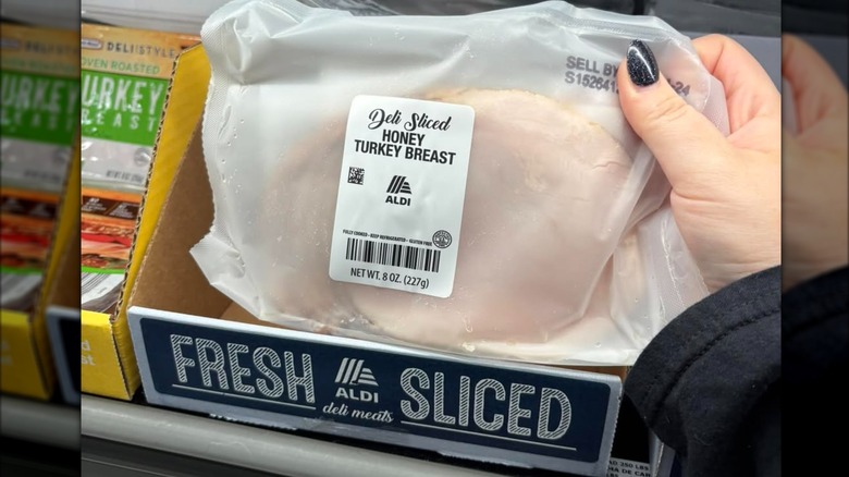Fresh sliced pre-packaged turkey breast on Aldi shelves