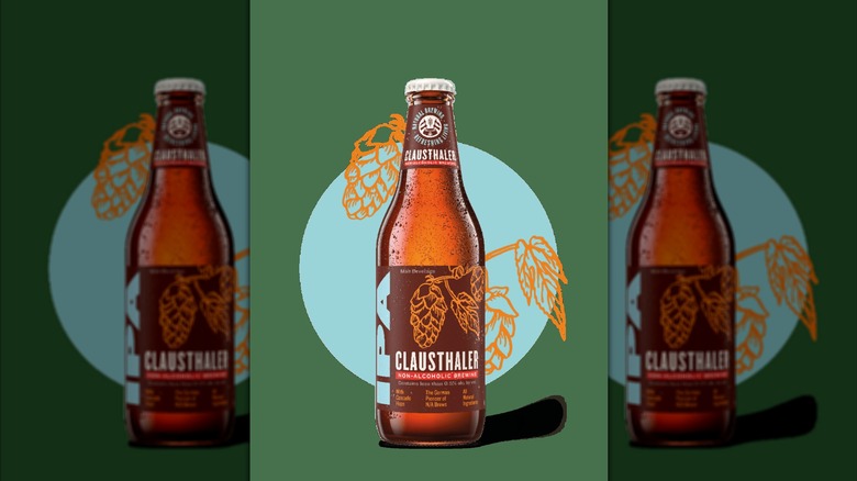 Clausthaler IPA against a green backdrop, haloed by a blue dot, mirrored