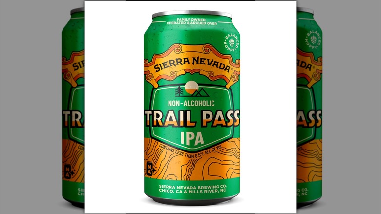 Orange and green can of Sierra Nevada Trail Pass IPA on a white background