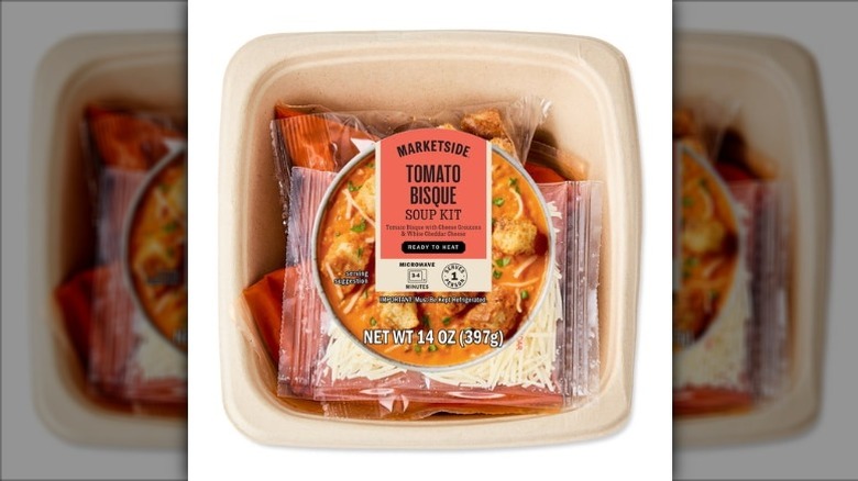 Marketside Ready to Heat Tomato Bisque Soup Kit packaged in a disposable bowl on a white background.