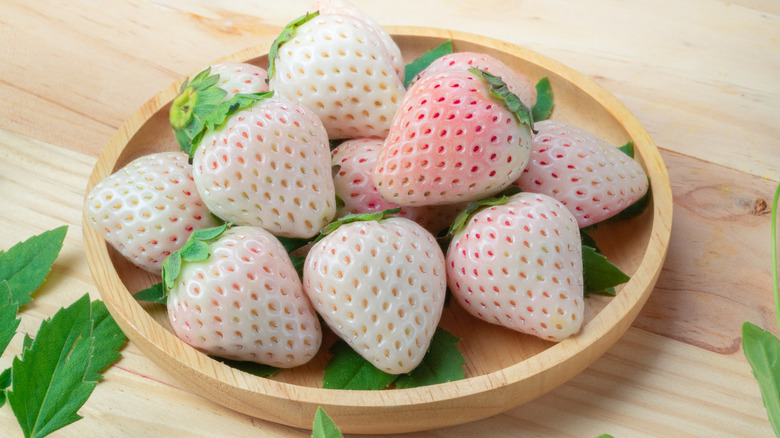 White strawberries on plate
