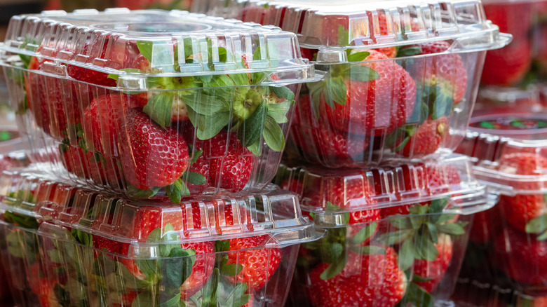 Strawberries in plastic containers