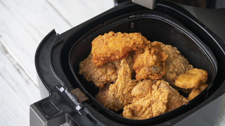 Chicken wings inside an air fryer