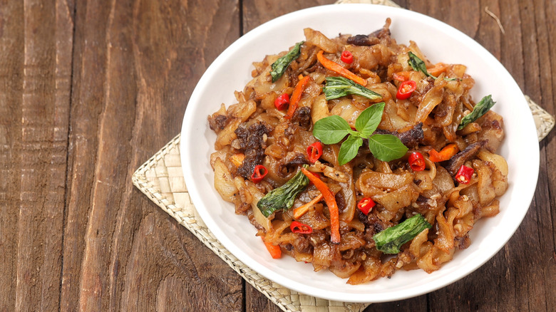 Thai Drunken Noodles in a white dish