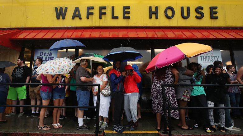 crowd lining up to enter a Waffle House in Wilmington, NC