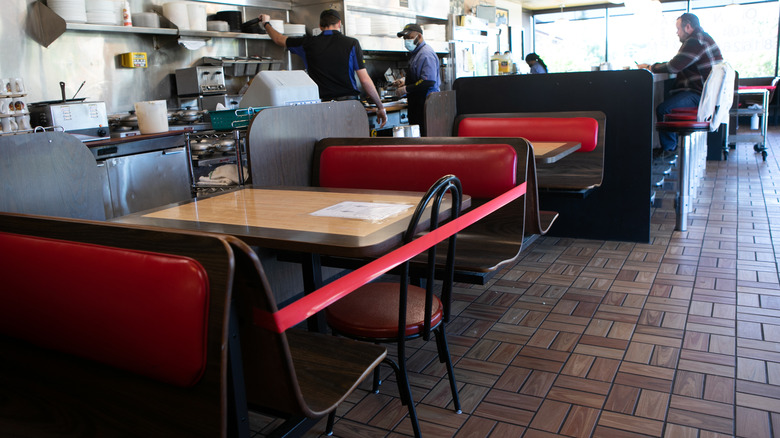 empty booths at a Waffle House restaurant