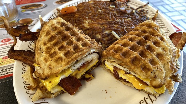 Corben Sandwich with bacon, egg, and cheese on a waffle