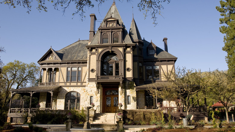 large house surrounded by trees