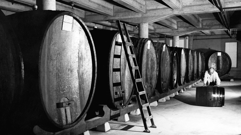 large wooden barrels with a ladder