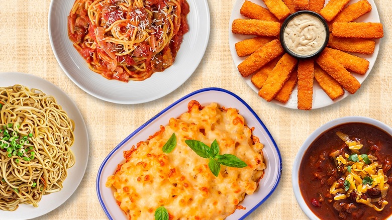 Photo illustration of bowls of chow mein, casserole, spaghetti, fish sticks, and chili