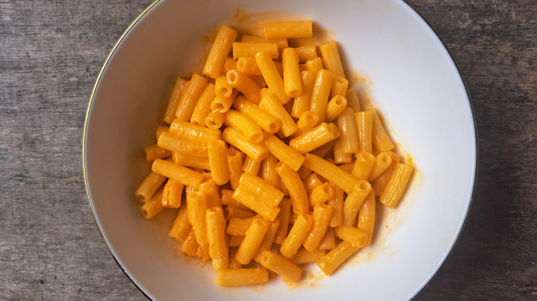 Prepared mac and cheese in a white bowl