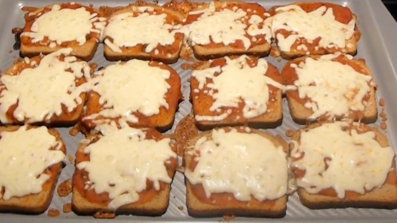 Tray of slices of Poor Man's Pizza being made