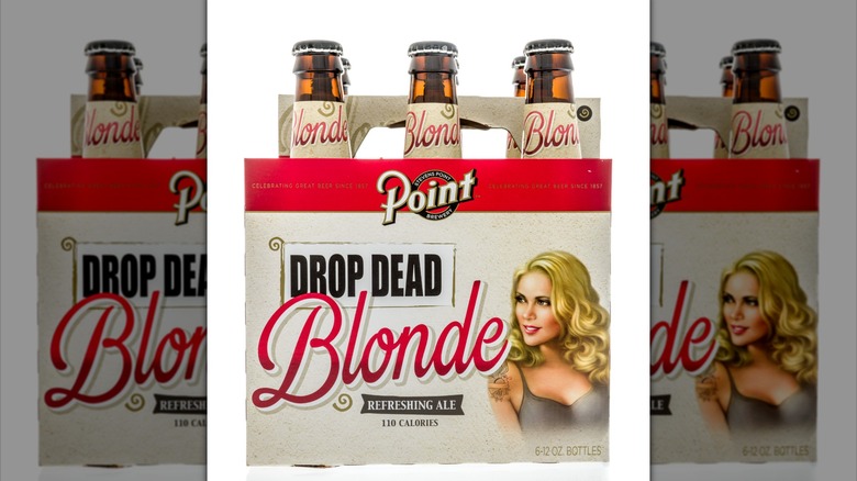 A six-pack of Point Beer Drop Dead Blonde Ale, mirrored