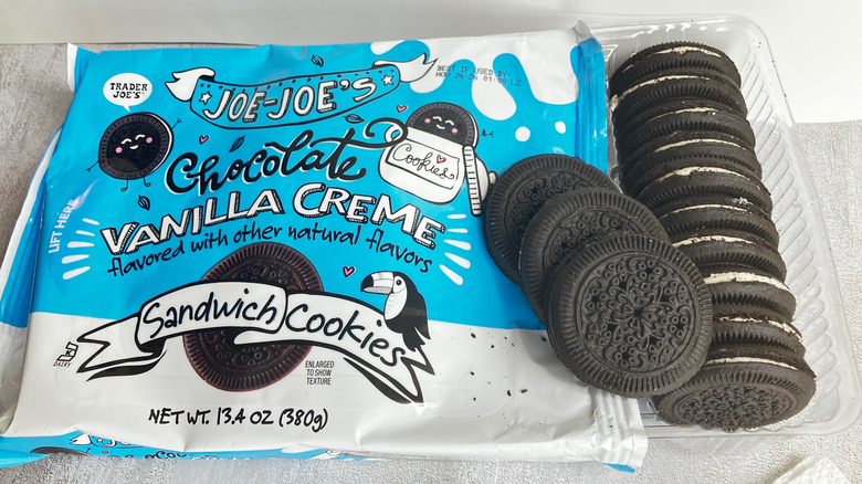 A row of Trader Joe's Joe-Joe's chocolate sandwich cookies pulled out of a blue and white package