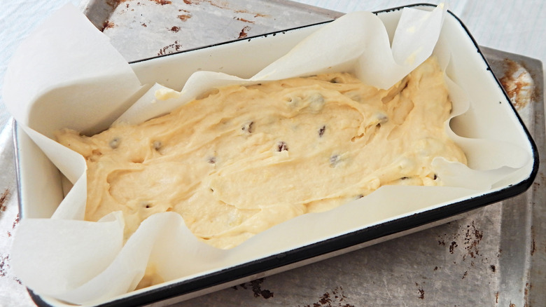 Cake on a pan lined with parchment paper