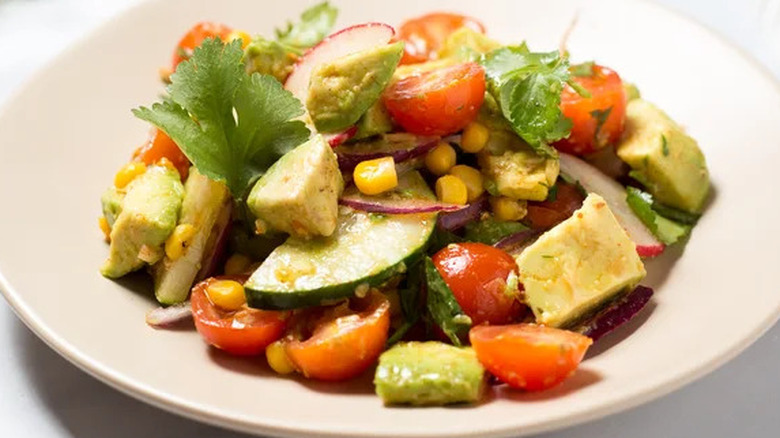 Southwest avocado salad in a white bowl