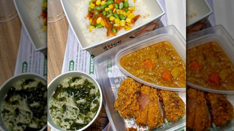 White rice with vegetables, fried chicken, curry, and egg drop soup from Dico's restaurant in China