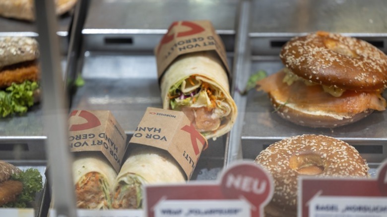Bagels and lox, wraps, and other sandwiches from NORDSEE in glass case