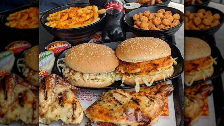 Bondi burgers, chili cheese fries, popcorn chicken , churros, and coke from Oporto in Australia